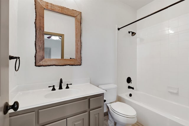 full bathroom featuring toilet, shower / bathtub combination, and vanity