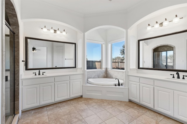 bathroom featuring ceiling fan, tile patterned floors, vanity, and crown molding