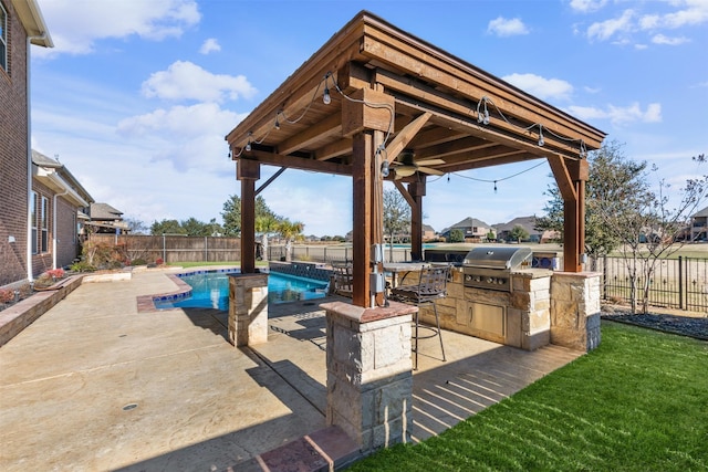 view of pool with a gazebo, a patio area, and area for grilling