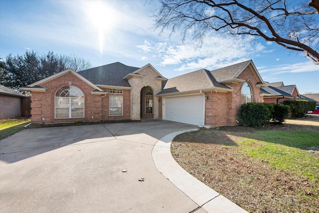 ranch-style house featuring a garage