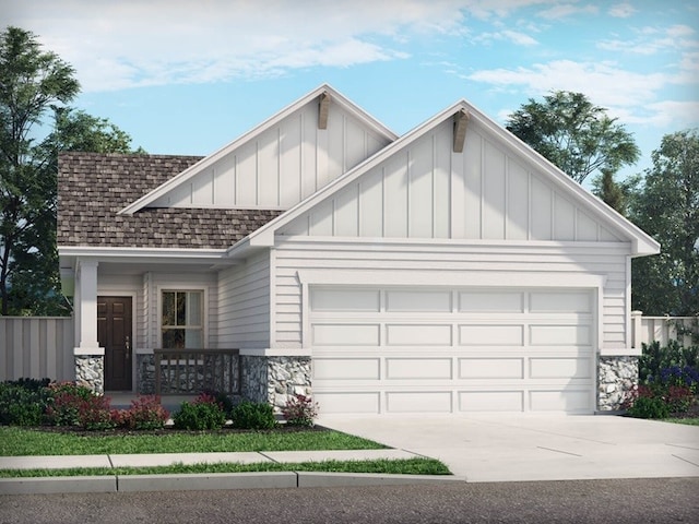 view of front of house with a garage and covered porch