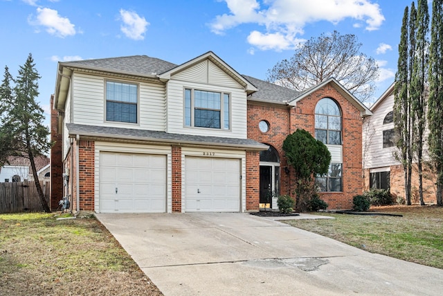 front of property with a garage and a front lawn