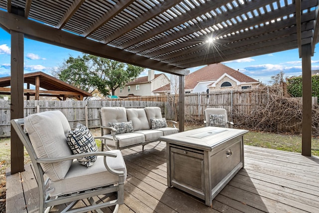 wooden terrace featuring outdoor lounge area and a pergola