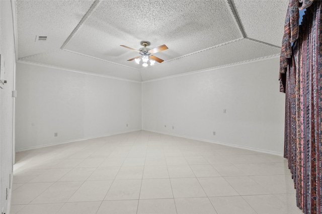 4247 Blackheath Rd, Dallas, TX 75227 - tiled empty room featuring ceiling fan, lofted ceiling, a textured ceiling, and ornamental molding