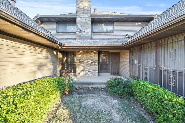 4247 Blackheath Rd, Dallas, TX 75227 - view of exterior entry featuring a patio area