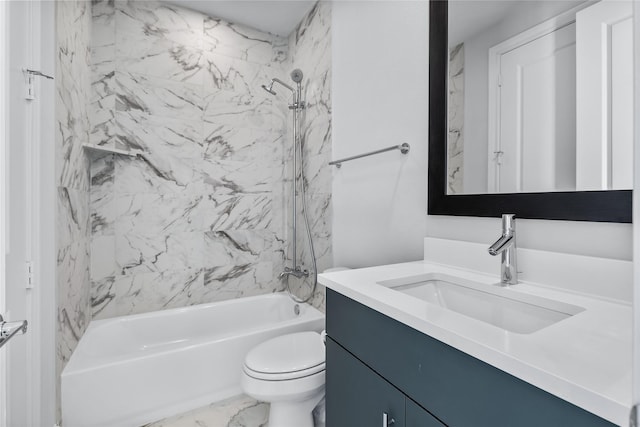 full bathroom with vanity, toilet, and tiled shower / bath