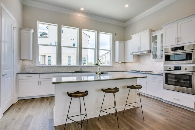 kitchen featuring white cabinetry and a kitchen island