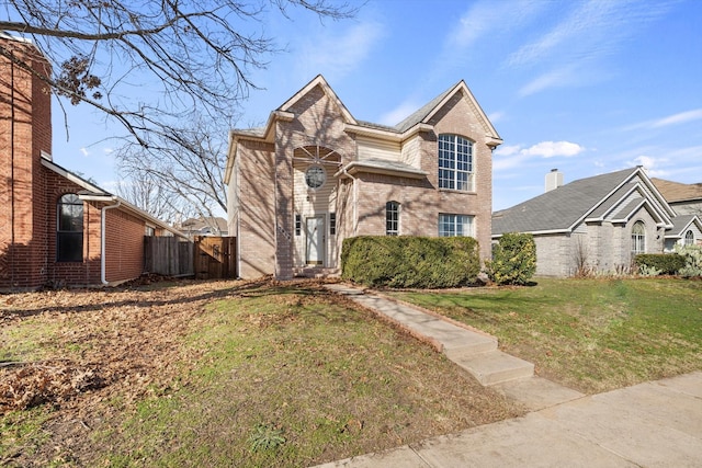 view of front property with a front lawn