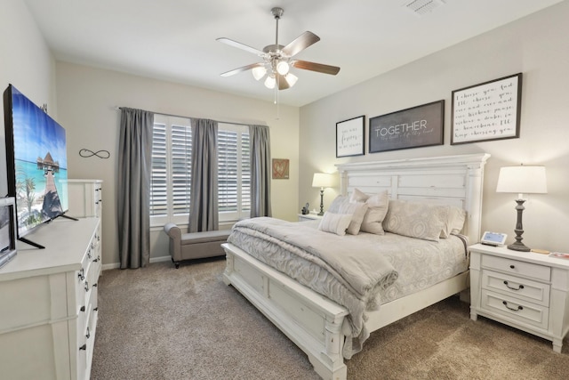 bedroom featuring ceiling fan and light carpet