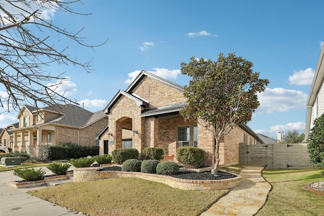 view of front of home with a front lawn