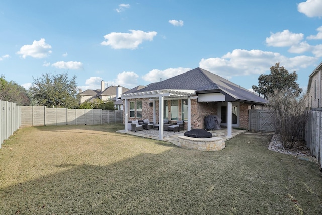 back of house featuring a lawn, a patio area, a pergola, and an outdoor living space with a fire pit