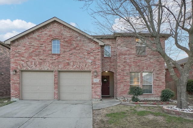 view of front of property with a garage