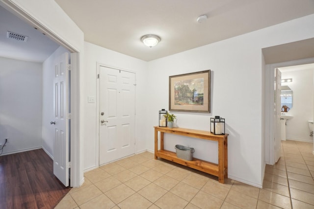 view of tiled foyer