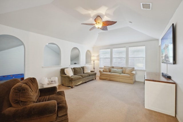 living room with lofted ceiling, light carpet, and ceiling fan