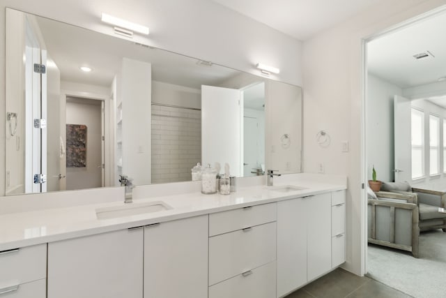 bathroom featuring vanity and tile patterned floors