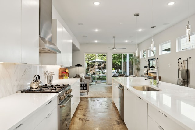 kitchen featuring white cabinetry, range hood, stainless steel appliances, tasteful backsplash, and decorative light fixtures