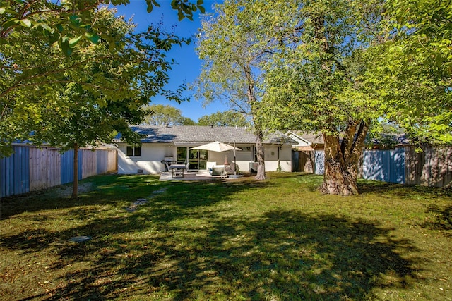 view of yard with a patio area