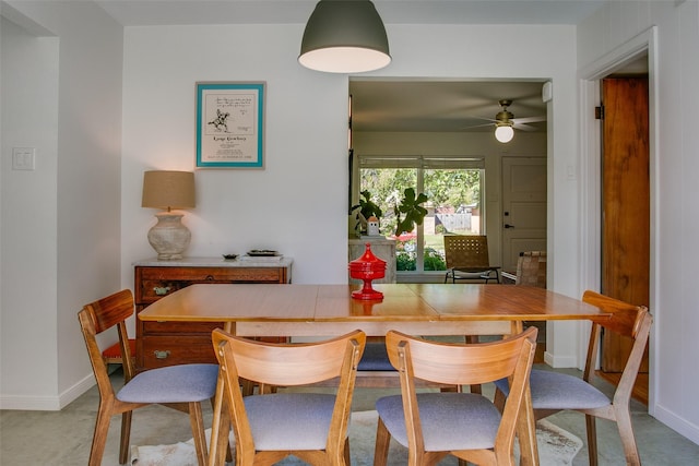 dining area with ceiling fan