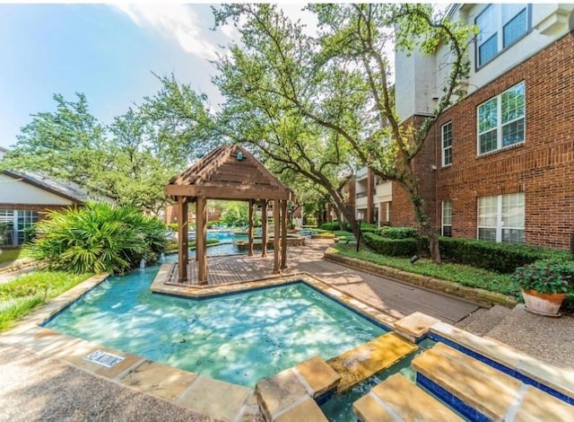 view of pool with a gazebo