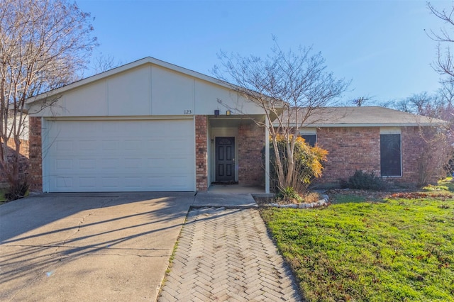 ranch-style home featuring a garage