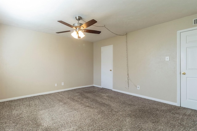 carpeted empty room featuring ceiling fan