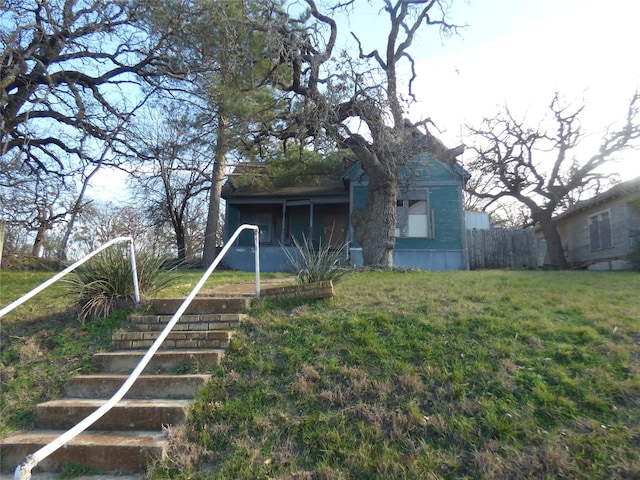 exterior space with a lawn