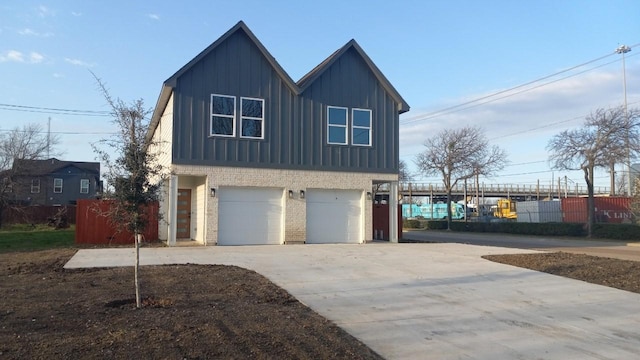 view of side of property with a garage