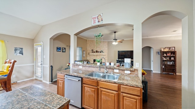 kitchen with ceiling fan, sink, stainless steel dishwasher, crown molding, and light wood-type flooring