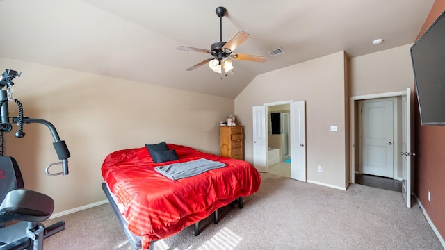 carpeted bedroom with connected bathroom, ceiling fan, and lofted ceiling