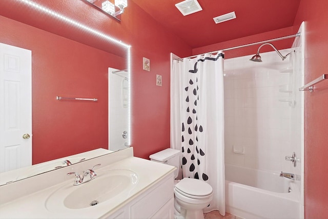 full bath featuring vanity, toilet, shower / bath combo, and visible vents