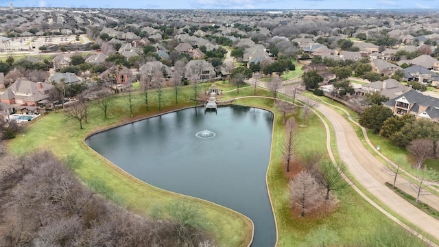 birds eye view of property featuring a residential view and a water view