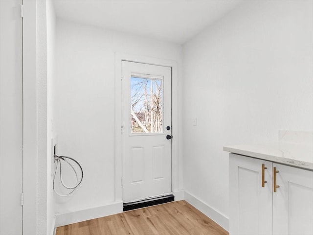 doorway featuring light wood-type flooring