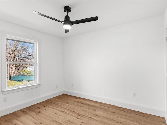 empty room featuring light hardwood / wood-style floors and ceiling fan