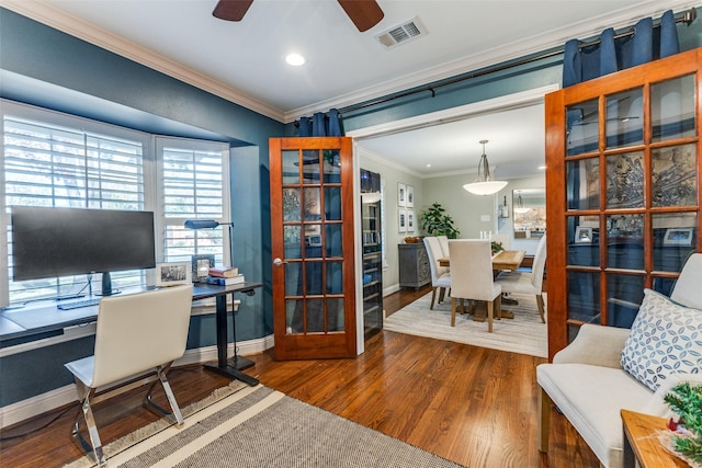 office area with dark hardwood / wood-style floors, ceiling fan, ornamental molding, and french doors