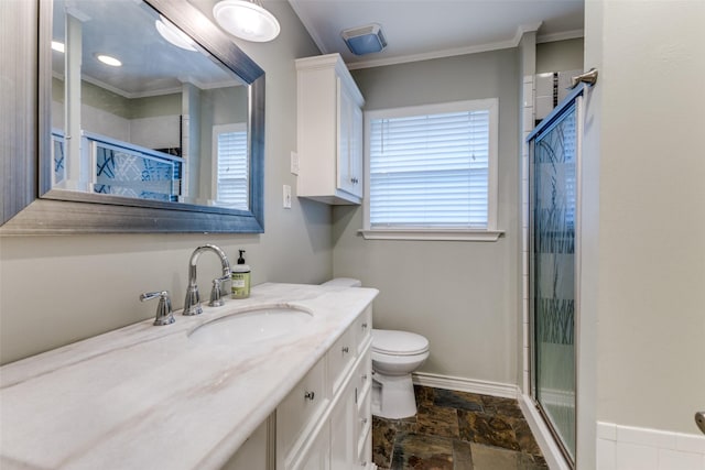 bathroom featuring vanity, toilet, and a shower with shower door