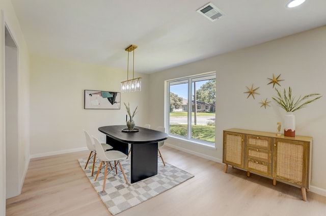 dining room featuring light hardwood / wood-style floors