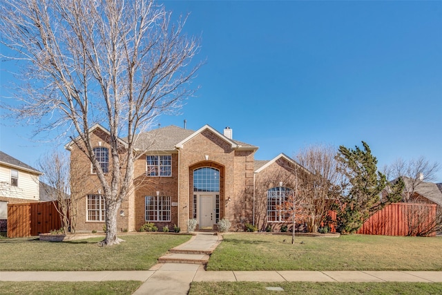 view of front property with a front lawn