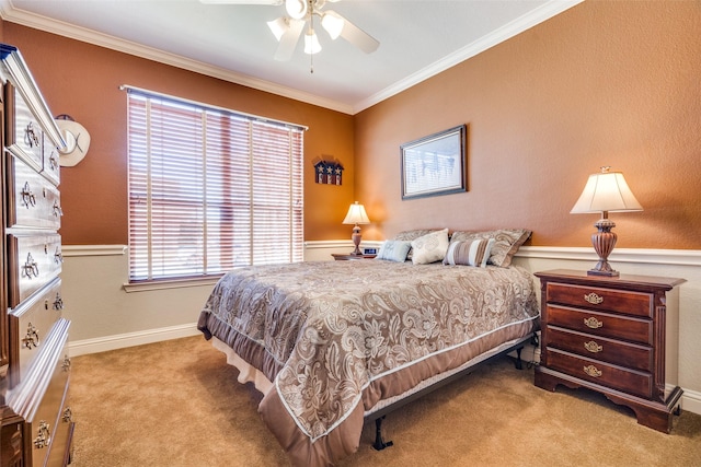 bedroom featuring multiple windows, light colored carpet, ceiling fan, and ornamental molding