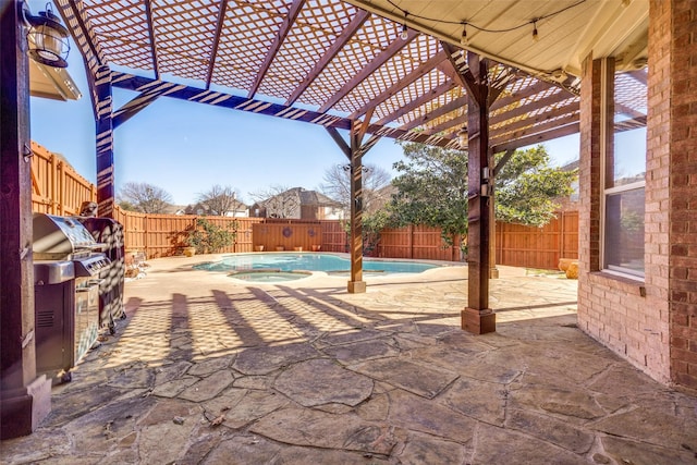 view of patio featuring a fenced in pool and a pergola