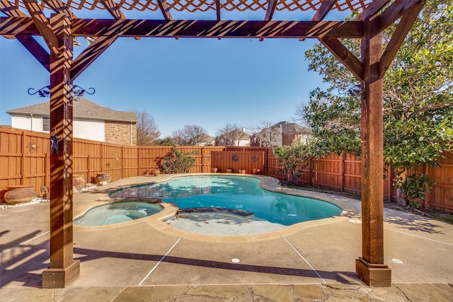 view of swimming pool featuring an in ground hot tub and a patio area