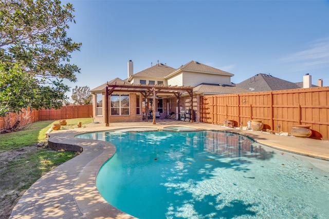 view of pool with a pergola and an in ground hot tub