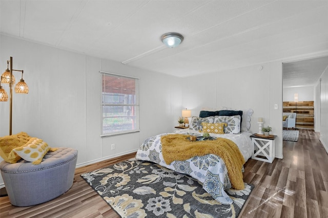 bedroom with hardwood / wood-style floors