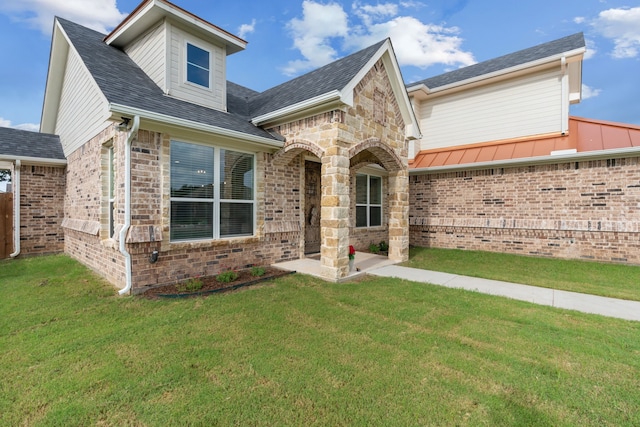 view of front of home with a front yard