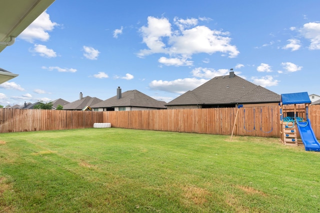 view of yard featuring a playground