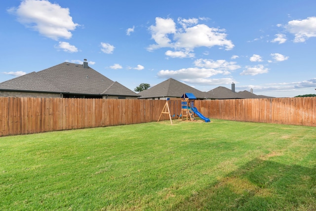 view of yard with a playground