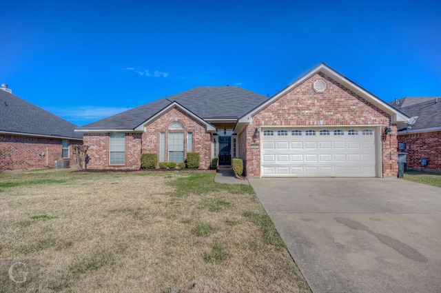 5845 Bluebonnett Dr, Bossier City, LA 71112 - view of front of home featuring central AC, a garage, and a front lawn