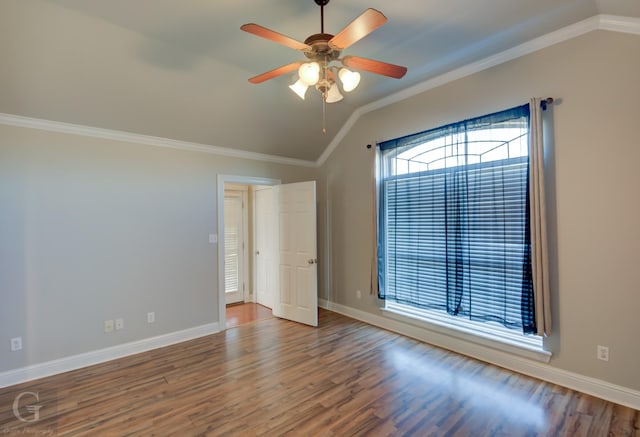 unfurnished bedroom with ornamental molding, ceiling fan, lofted ceiling, and hardwood / wood-style floors