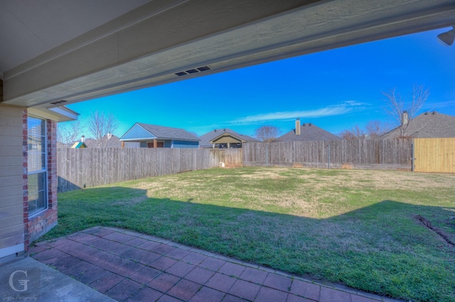 view of yard with a patio area