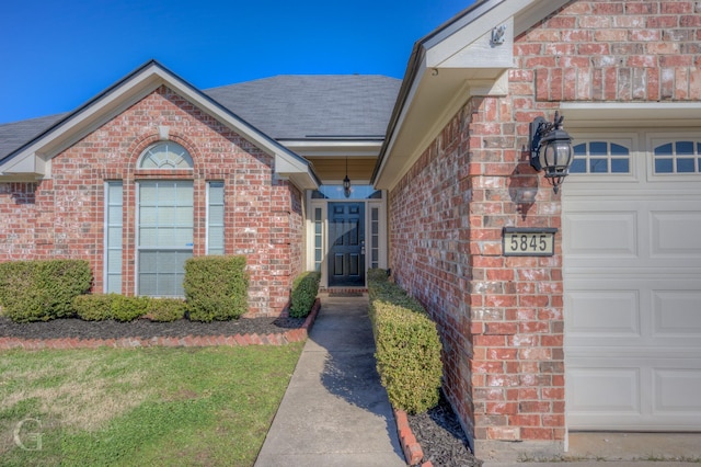 property entrance featuring a garage