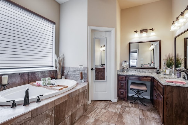 carpeted bedroom featuring ceiling fan, a tray ceiling, and crown molding